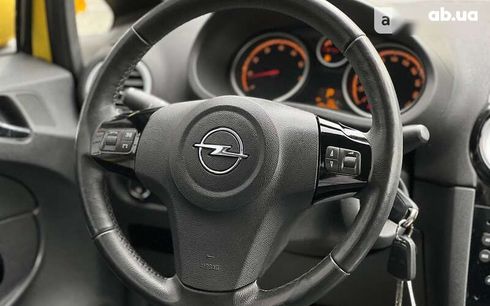 Opel Corsa 2011 - фото 14