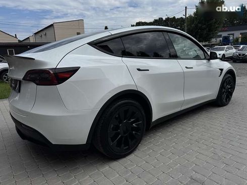 Tesla Model Y 2024 - фото 18