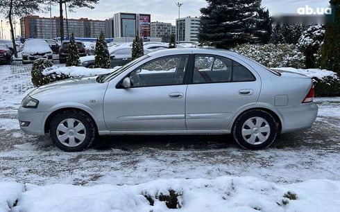 Nissan Almera 2011 - фото 4