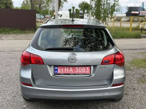 Opel Astra 2010 - фото 19