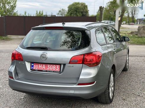 Opel Astra 2010 - фото 20