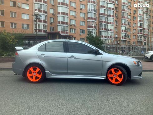 Mitsubishi Lancer 2008 серебристый - фото 15