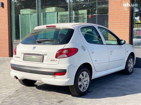 Peugeot 206 2009 - фото 11
