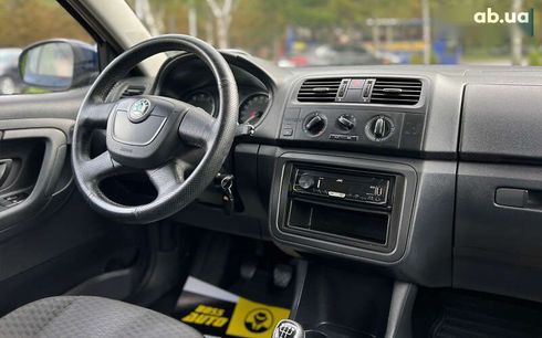 Skoda Fabia 2012 - фото 12