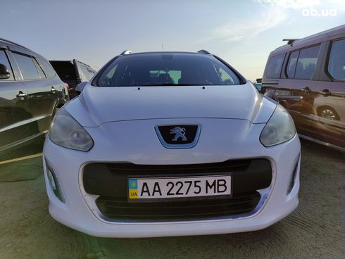Peugeot 308 2012 белый - фото 9