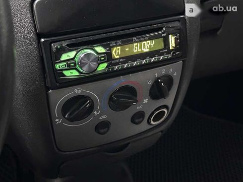 Ford Fiesta 2000 - фото 25