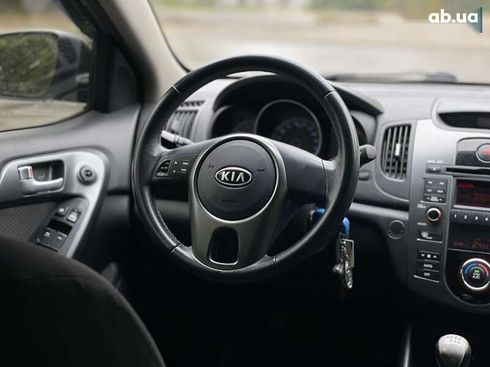 Kia Cerato 2011 - фото 16