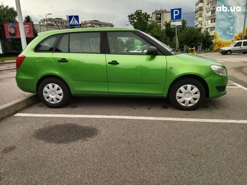 Skoda Fabia 2014 зеленый - фото 10