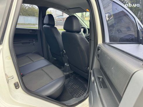 Mitsubishi Colt 2010 белый - фото 11
