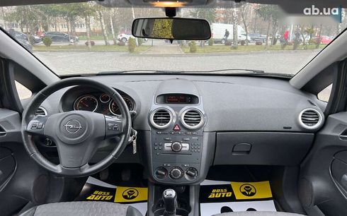 Opel Corsa 2011 - фото 12