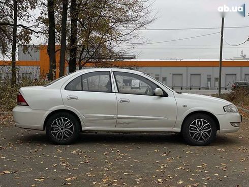 Nissan Almera 2011 - фото 15