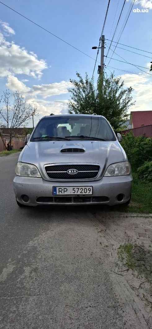 Kia Carnival 2005 серебристый - фото 9