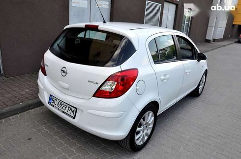 Opel Corsa 2012 - фото 6