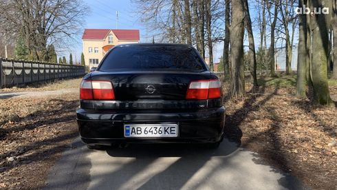 Opel Omega 2001 черный - фото 12