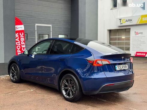 Tesla Model Y 2024 - фото 8