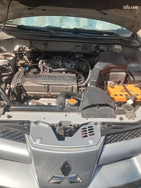 Mitsubishi Outlander 2003 серебристый - фото 11