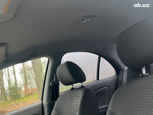Nissan Almera 2008 черный - фото 95