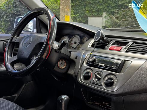 Mitsubishi Lancer 2005 серый - фото 54