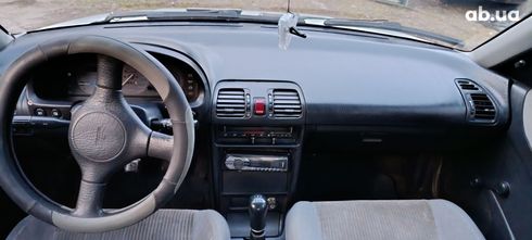 Mazda 323 1990 белый - фото 16
