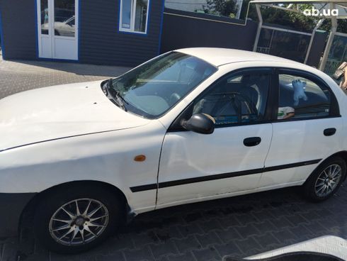 Daewoo Lanos 1998 белый - фото 8
