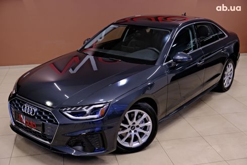 Audi A4 2023 серый - фото 2
