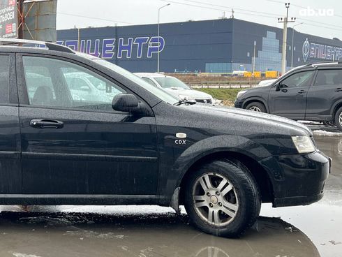 Chevrolet Lacetti 2005 черный - фото 21