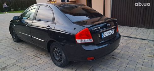 Kia Cerato 2007 черный - фото 6
