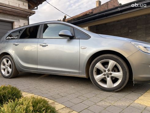 Opel Astra J 2011 серый - фото 15