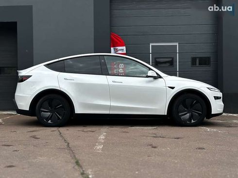 Tesla Model Y 2025 - фото 11
