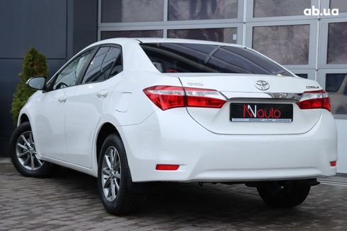 Toyota Corolla 2015 белый - фото 4