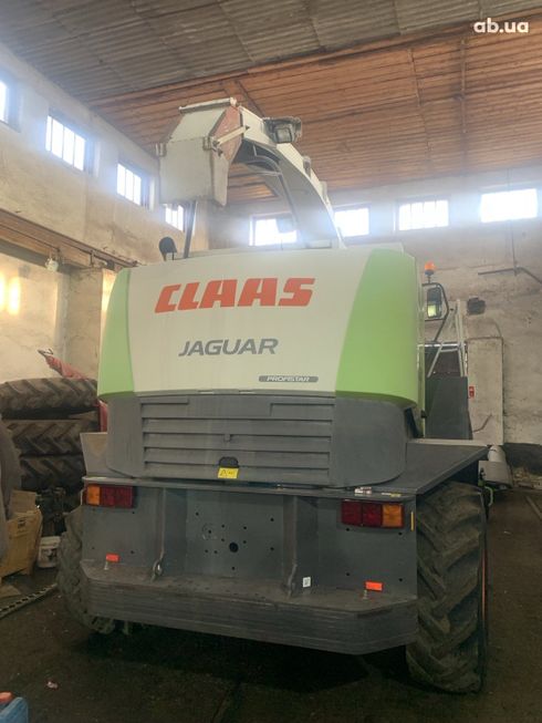 Claas Jaguar 870 2011 зеленый - фото 6