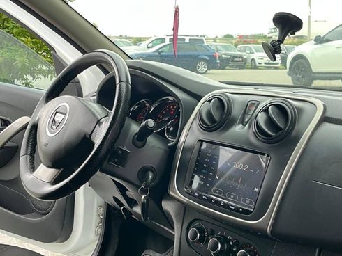 Dacia Logan 2015 белый - фото 31