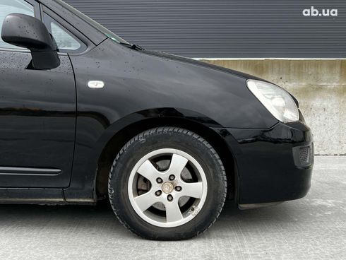 Kia Carens 2006 черный - фото 15