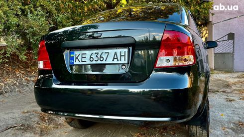 Chevrolet Aveo 2005 черный - фото 7