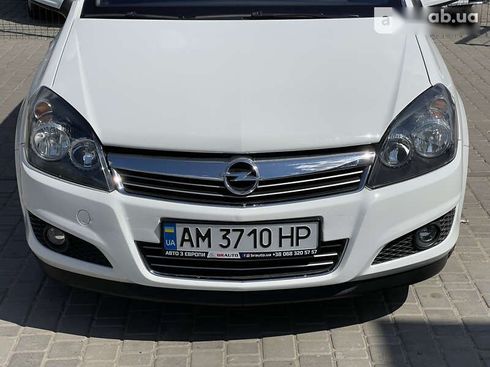 Opel Astra 2010 - фото 14