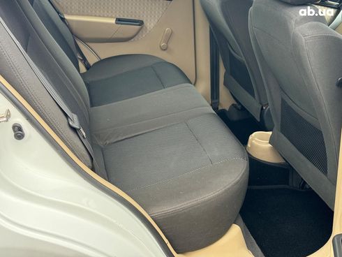 Chevrolet Aveo 2008 белый - фото 20