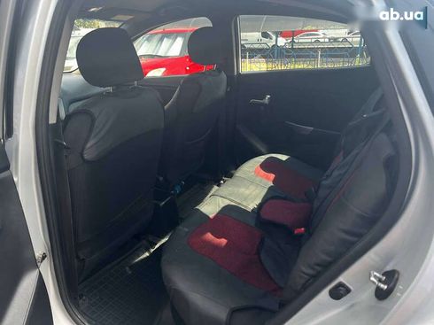 Kia Rio 2013 - фото 17