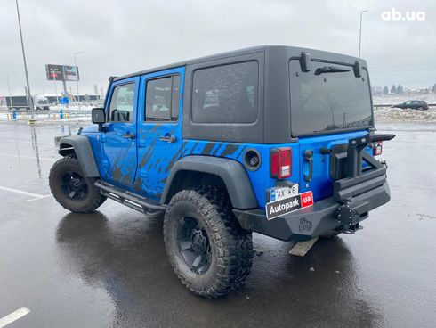 Jeep Wrangler 2014 синий - фото 12