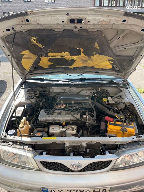 Nissan Almera 1998 серебристый - фото 12
