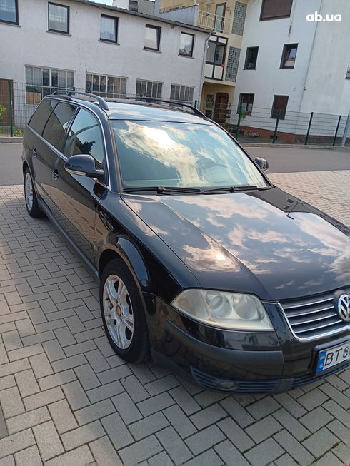 Volkswagen Passat 2004 черный - фото 4