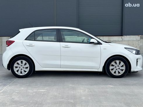 Kia Rio 2017 белый - фото 11