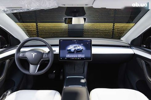 Tesla Model Y 2024 - фото 29