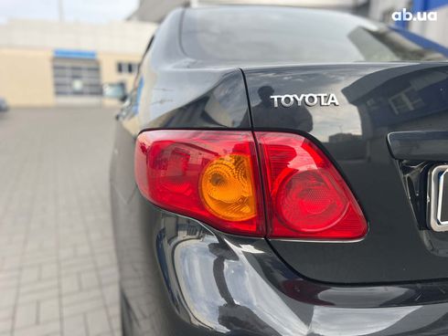 Toyota Corolla 2008 черный - фото 11