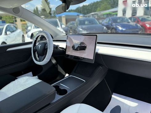 Tesla Model Y 2024 - фото 24