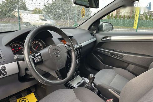 Opel Astra 2010 - фото 12