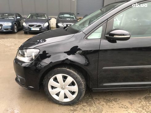 Volkswagen Touran 2013 черный - фото 2