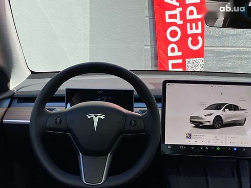 Tesla Model Y 2024 - фото 18