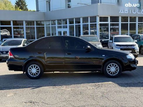 Nissan Almera 2012 - фото 4