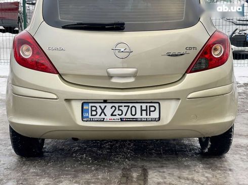 Opel Corsa 2008 - фото 25