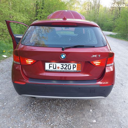 BMW X1 2011 - фото 11